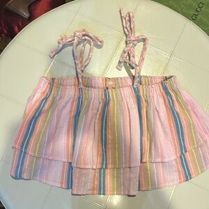 Cute summer top! Cropped, adjustable sleeves.